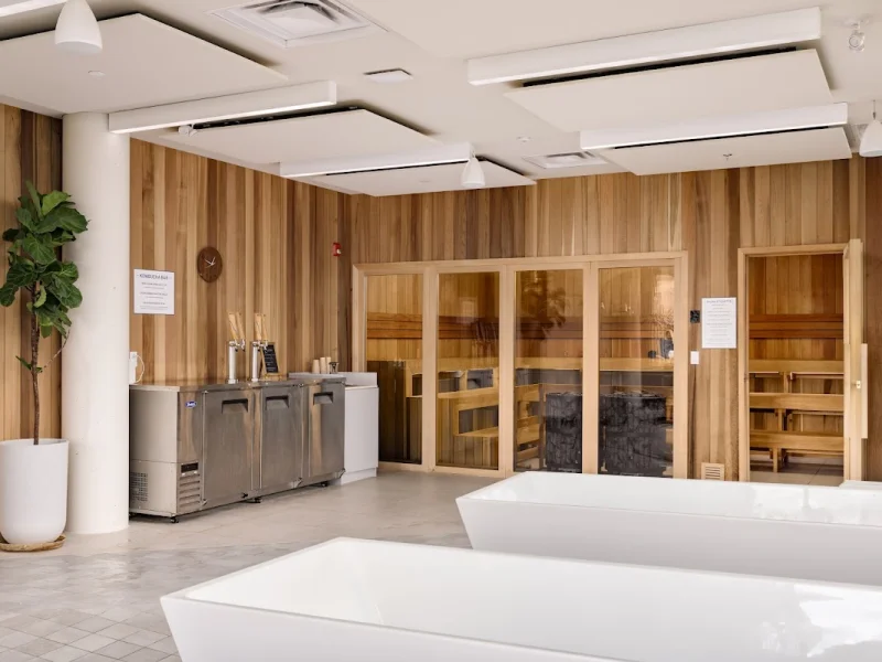 Spacious spa lounge with sauna rooms and plunge tubs