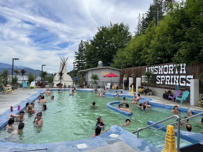 Ainsworth Hot Springs pool with mountain setting and outdoor relaxation