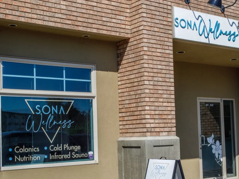 Exterior storefront of Sona Wellness in Kelowna with branded signage