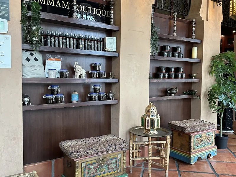 Miraj Hammam Boutique Spa retail display with curated products and Moroccan-inspired seating